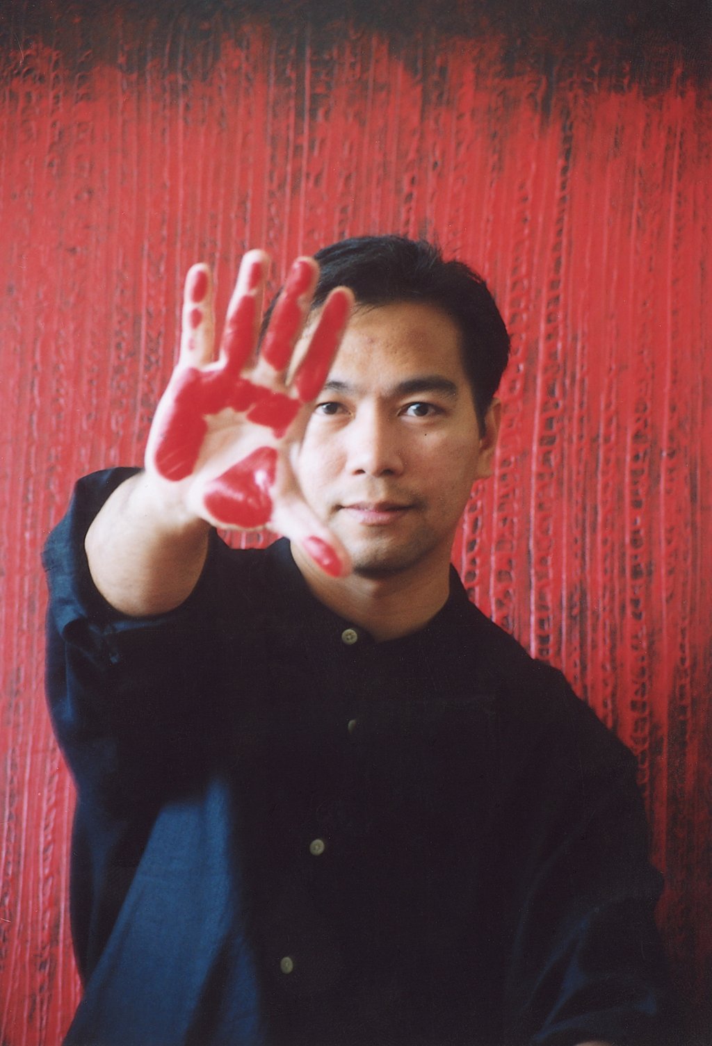 In the 1990s and 2000s, Noel de Guzman used his palms and fingers to create abstract pieces. Photo: Handout In the 1990s and 2000s, Noel de Guzman used his palms and fingers to create abstract pieces. Photo: Handout