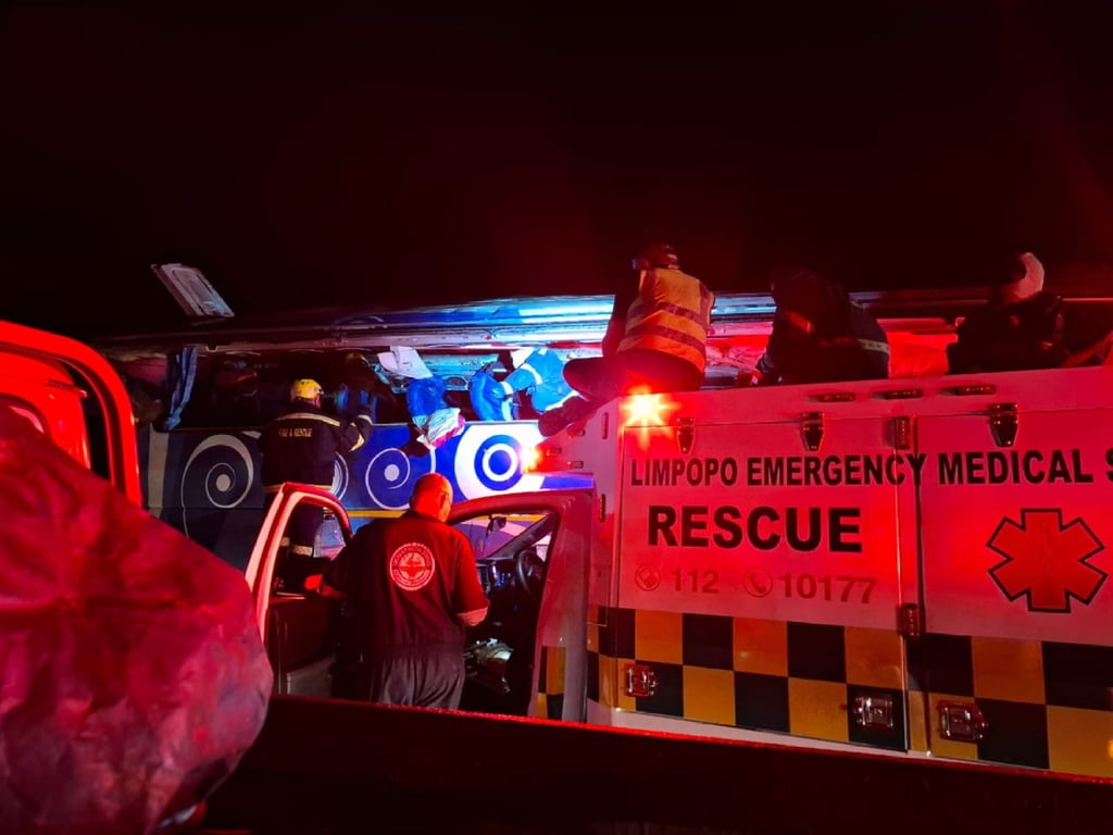 Crews work at the scene of a bus crash in South Africa on Monday. Photo: Arrive Alive/ EPA
