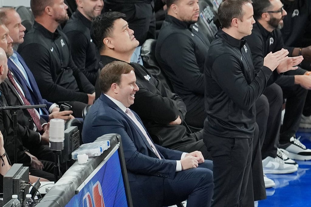 Patrick Dumont (centre) with Chinese icon Yao Ming at the Venetian Arena on Sunday. Photo: Karma Lo Patrick Dumont (centre) with Chinese icon Yao Ming at the Venetian Arena on Sunday. Photo: Karma Lo