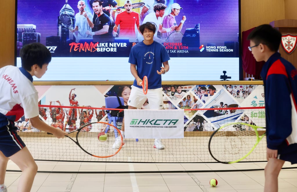 Zhang Zhizhen plays tennis with youngsters at S.K.H. St. Michael’s Primary School. Photo: Jonathan Wong Zhang Zhizhen plays tennis with youngsters at S.K.H. St. Michael’s Primary School. Photo: Jonathan Wong
