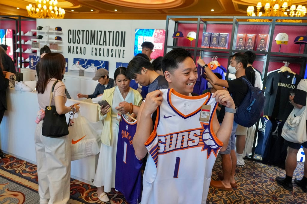 Fans browse NBA China Games 2025 merchandise at The Venetian in Macau. Photo: Karma Lo