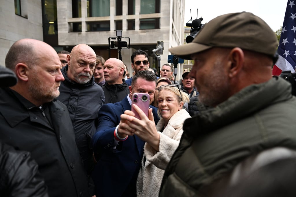 Tommy Robinson leaving the court. Photo: Reuters Tommy Robinson leaving the court. Photo: Reuters
