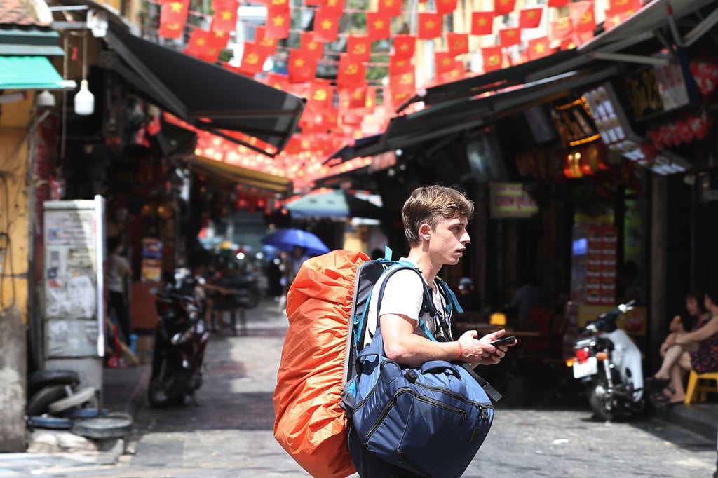 A foreign tourist walks on a street in Hanoi, Vietnam, on Monday. Hanoi won the Asia’s Leading City Destination award at the 2025 World Travel Awards. Photo: EPA A foreign tourist walks on a street in Hanoi, Vietnam, on Monday. Hanoi won the Asia’s Leading City Destination award at the 2025 World Travel Awards. Photo: EPA