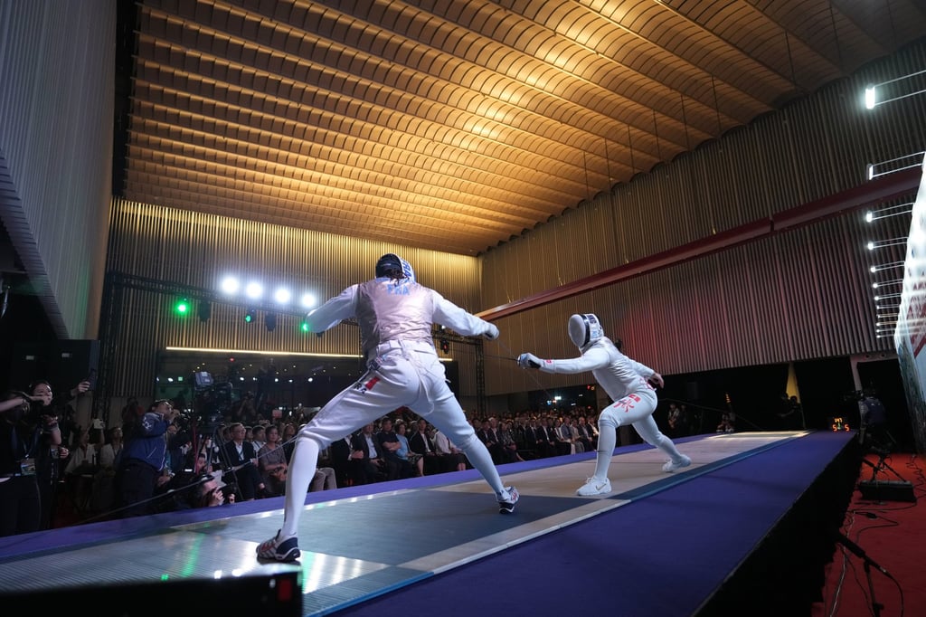 Cheung Ka-long (right) facing French foilist Enzo Lefort in an exhibition match in August. Photo: Sam Tsang Cheung Ka-long (right) facing French foilist Enzo Lefort in an exhibition match in August. Photo: Sam Tsang
