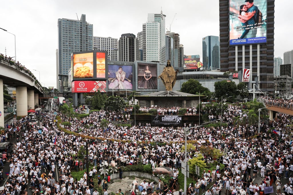 Thousands of Filipino protesters gather at the EDSA Shrine in Quezon City to rally against government corruption on September 21. Photo: AP Thousands of Filipino protesters gather at the EDSA Shrine in Quezon City to rally against government corruption on September 21. Photo: AP