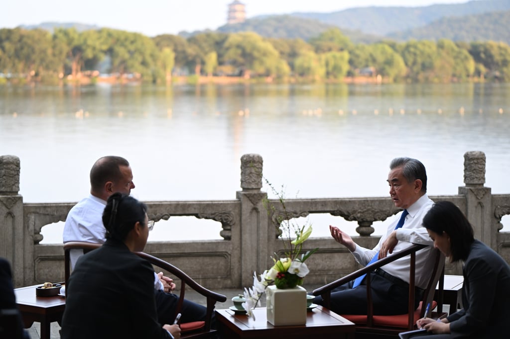 Emmanuel Bonne, diplomatic adviser to the French President, and Chinese Foreign Minister Wang Yi during discussions in Hangzhou, eastern China on Wednesday. Photo: Xinhua Emmanuel Bonne, diplomatic adviser to the French President, and Chinese Foreign Minister Wang Yi during discussions in Hangzhou, eastern China on Wednesday. Photo: Xinhua