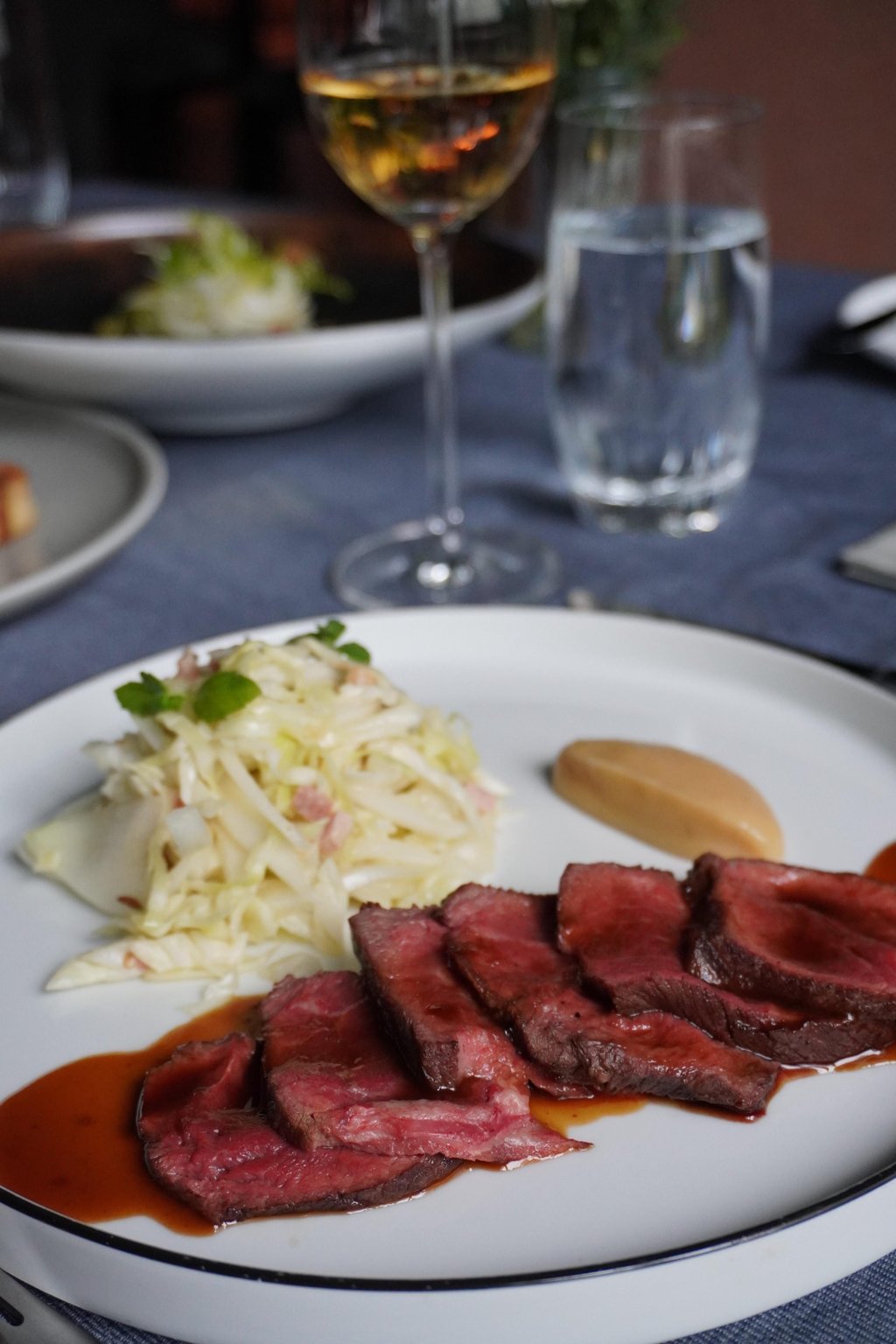 Warrendale Wagyu-Holstein beef with smoked garlic purée and garlic confit at Heimat. Photo: Heimat