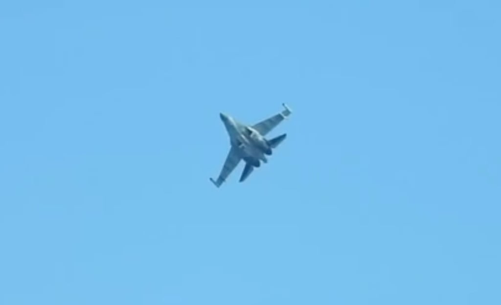 The Philippine coastguard said a Chinese J-16 fighter had been “harassing” its planes. Photo: Handout The Philippine coastguard said a Chinese J-16 fighter had been “harassing” its planes. Photo: Handout