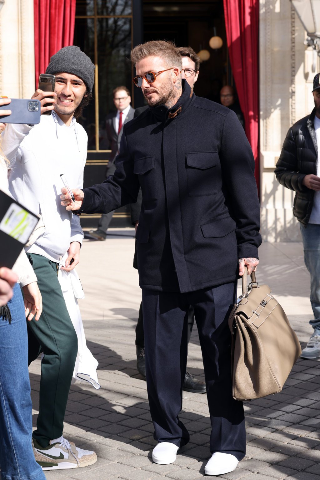 David Beckham leaves his hotel during Paris Fashion Week in March. Photo: Getty Images David Beckham leaves his hotel during Paris Fashion Week in March. Photo: Getty Images