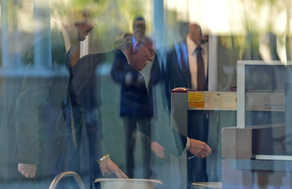 Former White House national security adviser John Bolton goes through security as he arrives at a Maryland court on Friday. Photo: Reuters Former White House national security adviser John Bolton goes through security as he arrives at a Maryland court on Friday. Photo: Reuters
