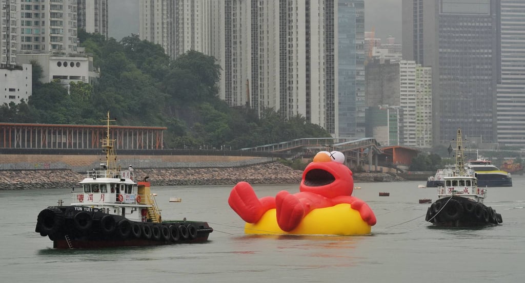 A massive inflatable Elmo, reimagined by pop artist KAWS, is taken for a test run around the waters off Tsing Yi ahead of the Water Parade event in Hong Kong’s Victoria Harbour later this month. Photo: Elson Li