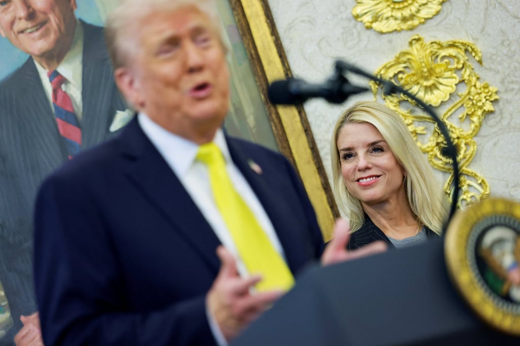 US Attorney General Pam Bondi listens while US President Donald Trump speaks during a press conference in the Oval Office on Wednesday. Photo: Reuters US Attorney General Pam Bondi listens while US President Donald Trump speaks during a press conference in the Oval Office on Wednesday. Photo: Reuters