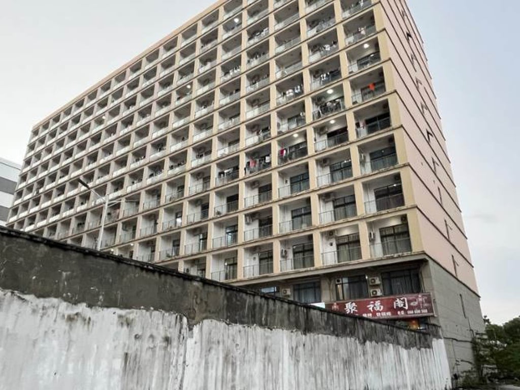 A high-walled building in Sihanoukville, which is believed to be part of a criminal scam compound. Photo: Hankook Ilbo A high-walled building in Sihanoukville, which is believed to be part of a criminal scam compound. Photo: Hankook Ilbo
