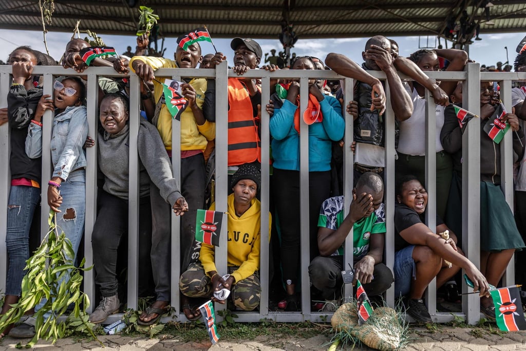 Mourners and supporters of Kenya’s opposition leader Raila Odinga react in grief and tears after seeing Odinga’s coffin arrive in Kisumu on Saturday. Photo: AFP Mourners and supporters of Kenya’s opposition leader Raila Odinga react in grief and tears after seeing Odinga’s coffin arrive in Kisumu on Saturday. Photo: AFP