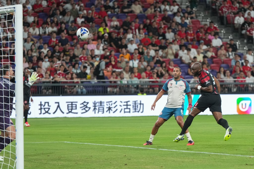 Louis Saha (right) pulled a goal back with a first-half header for the Rio 11. Photo: Eugene Lee
