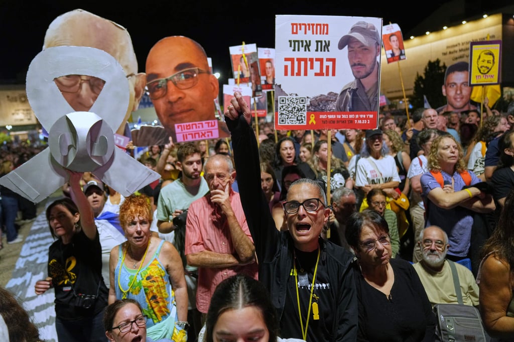 People take part in a rally in Tel Aviv, Israeli, on Saturday demanding the return of the bodies of hostages kidnapped by Hamas. Photo: AP People take part in a rally in Tel Aviv, Israeli, on Saturday demanding the return of the bodies of hostages kidnapped by Hamas. Photo: AP