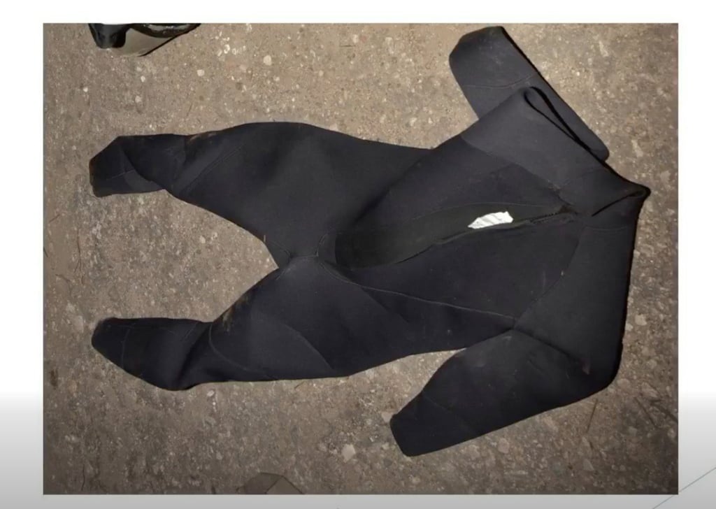 A diving suit was found near the shore along with other equipment. Photo: HKPF A diving suit was found near the shore along with other equipment. Photo: HKPF