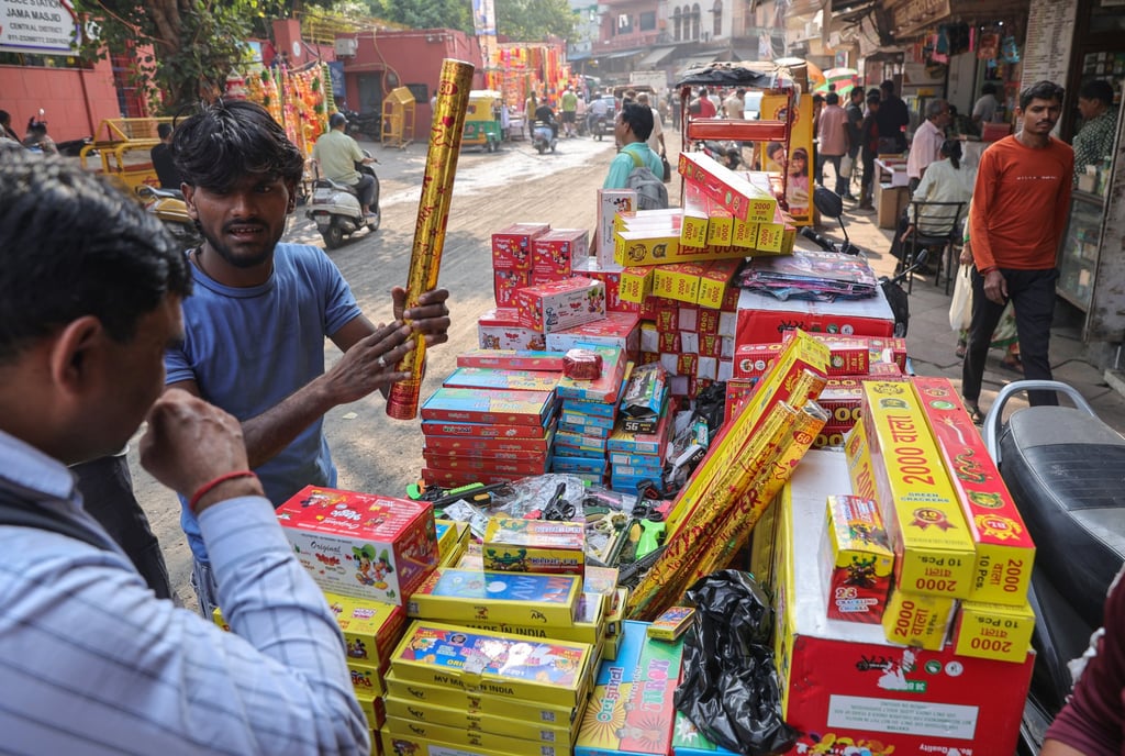 A street vendor sells fireworks last week near Jama Masjid mosque in the old quarter of Delhi. Photo: EPA A street vendor sells fireworks last week near Jama Masjid mosque in the old quarter of Delhi. Photo: EPA