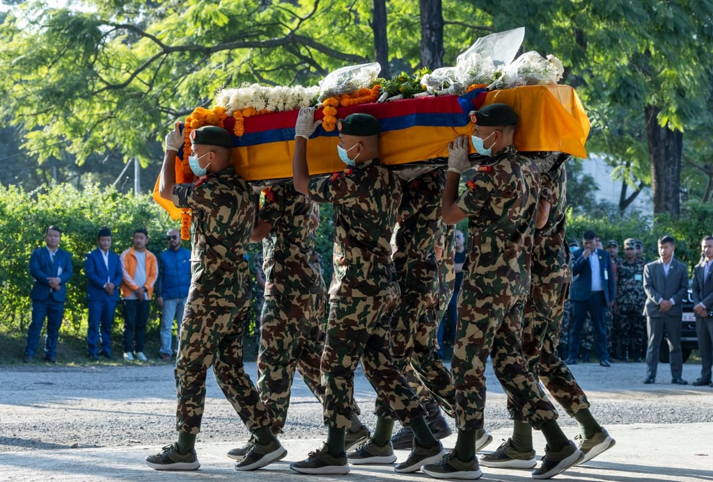 Nepalese army officers carry the coffin of late Nepalese hostage Bipin Joshi during a memorial ceremony procession on Monday. Photo: EPA Nepalese army officers carry the coffin of late Nepalese hostage Bipin Joshi during a memorial ceremony procession on Monday. Photo: EPA