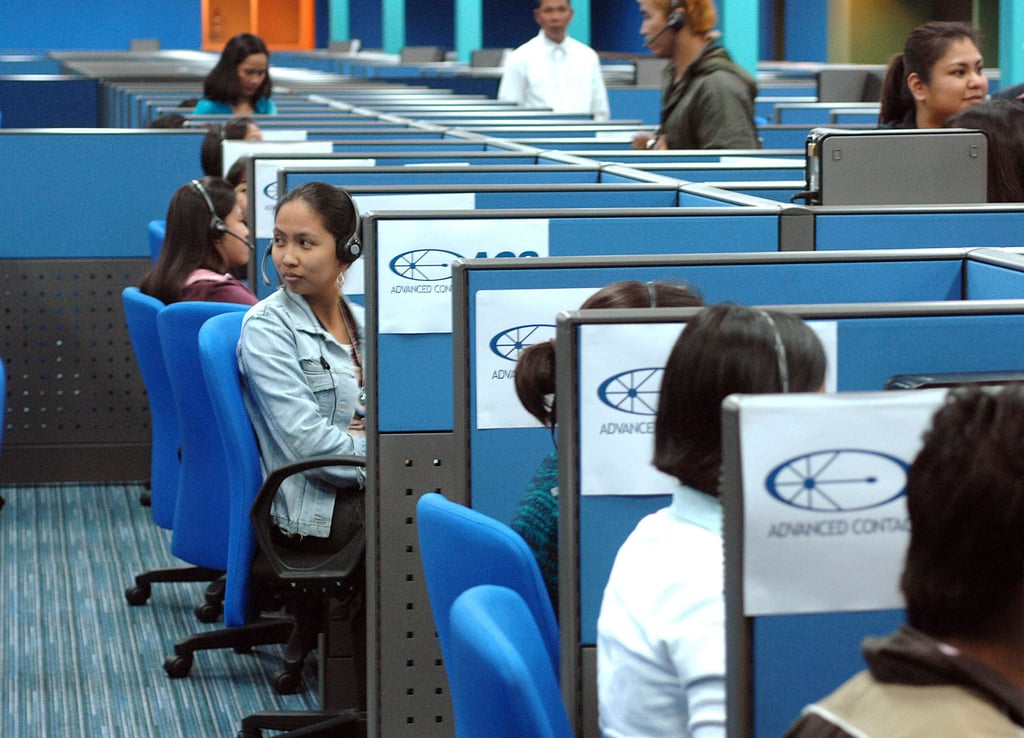 Filipino call centre workers attend to US-based clients at a BPO office in Manila. Photo: AFP Filipino call centre workers attend to US-based clients at a BPO office in Manila. Photo: AFP