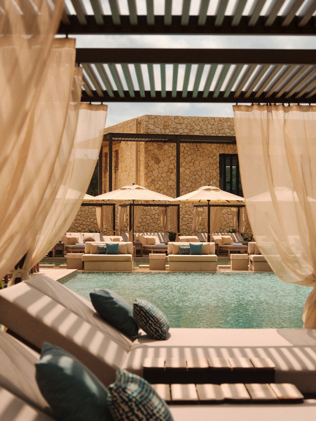 Sunbeds by the pool at Rosewood Mayakoba. Photo: Handout