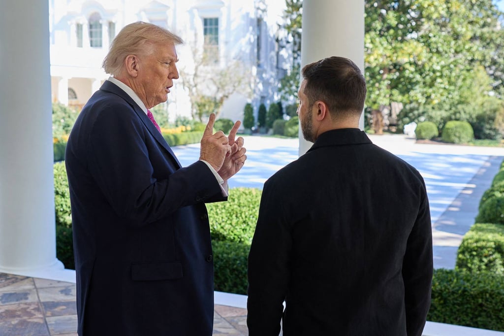US President Donald Trump speaking with Ukraine’s President Volodymyr Zelensky at the White House on Friday. Photo: Ukrainian Presidential Press Service via AFP