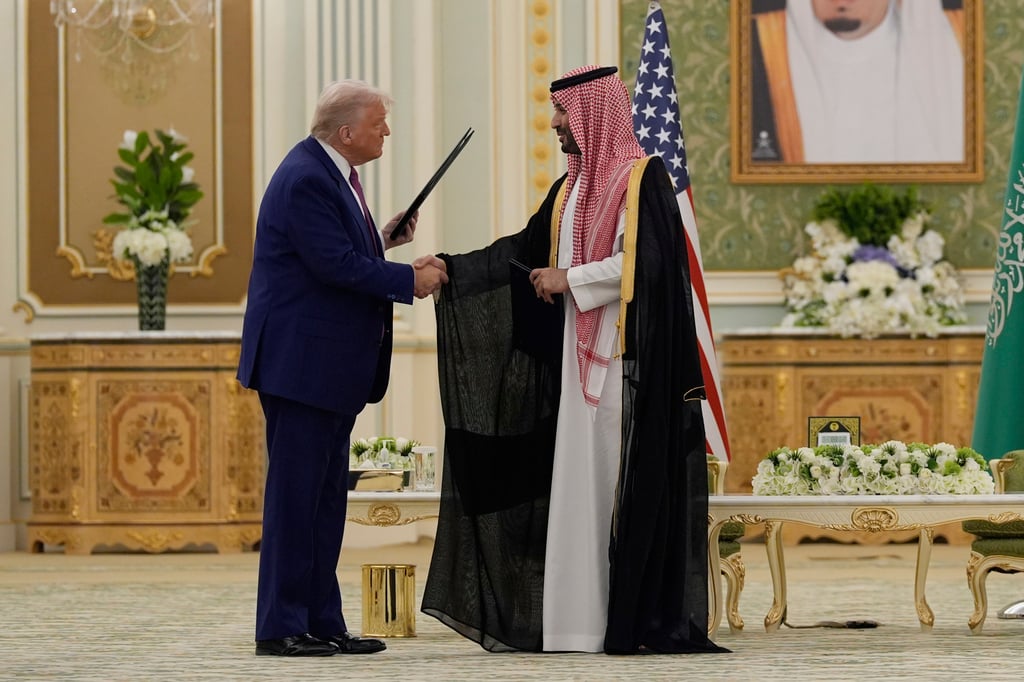 Trump and Salman shake hands after exchanging documents during a signing ceremony at the Royal Palace in Riyadh, Saudi Arabia in May. Photo: AP