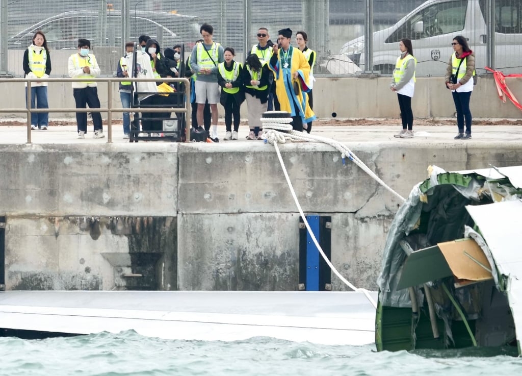 Families of the two victims return to the scene for a ritual mourning ceremony. Photo: Sam Tsang Families of the two victims return to the scene for a ritual mourning ceremony. Photo: Sam Tsang