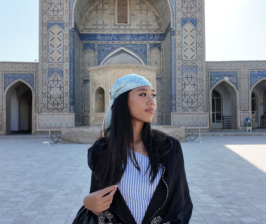 Hongkonger Kaylie Lau stands outside Kalan Mosque in Bukhara, Uzbekistan. Photo: Kaylie Lau Hongkonger Kaylie Lau stands outside Kalan Mosque in Bukhara, Uzbekistan. Photo: Kaylie Lau