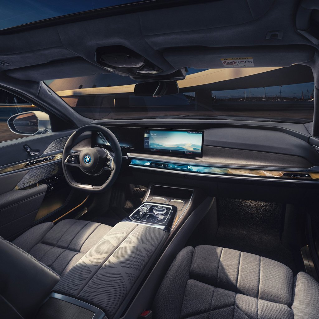 The BMW Curved Display and new BMW Interaction Bar. Photo: Handout The BMW Curved Display and new BMW Interaction Bar. Photo: Handout