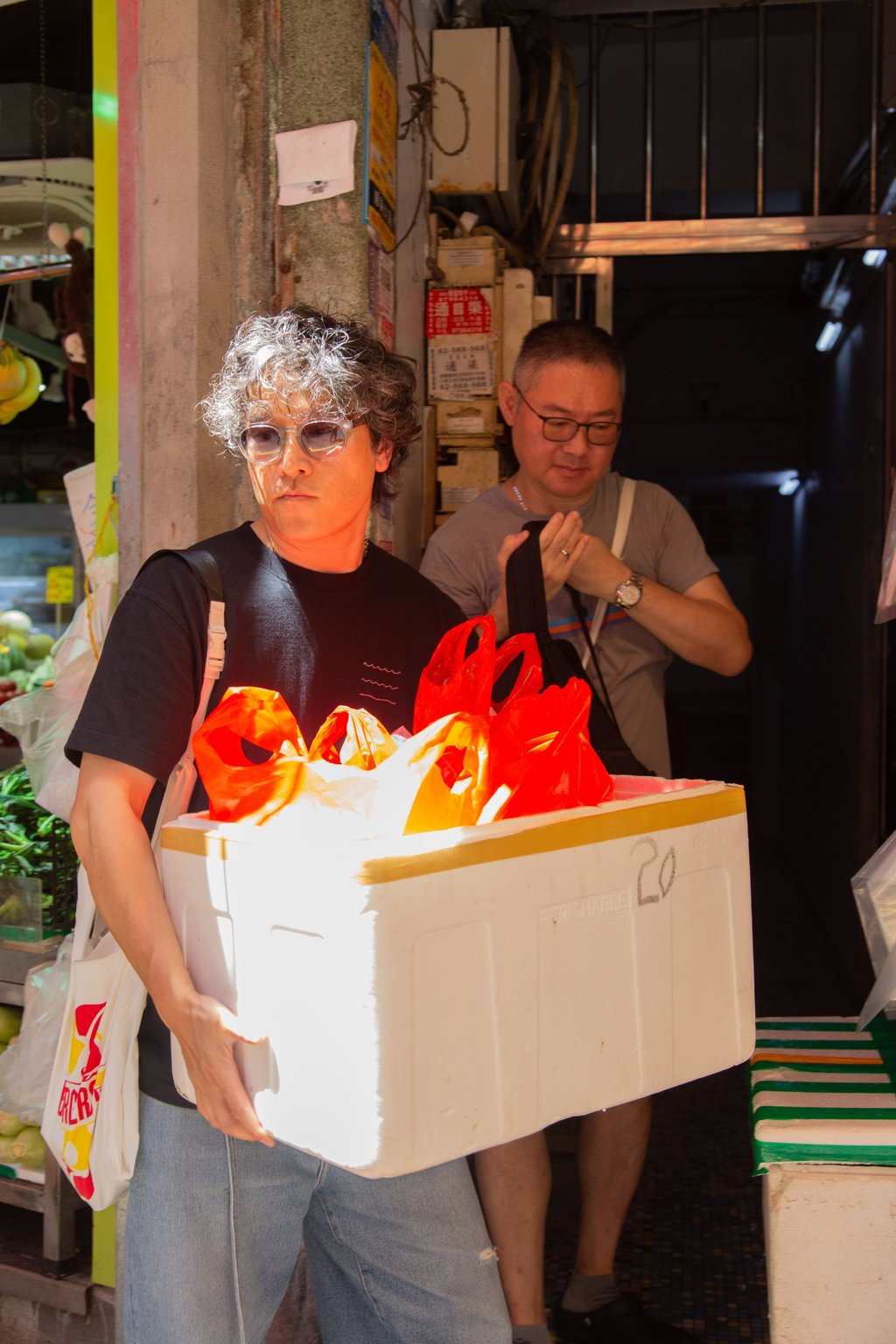 Artist David Leung (left) and chef David Lai on a wet market run. Photo: courtesy Side Space Artist David Leung (left) and chef David Lai on a wet market run. Photo: courtesy Side Space