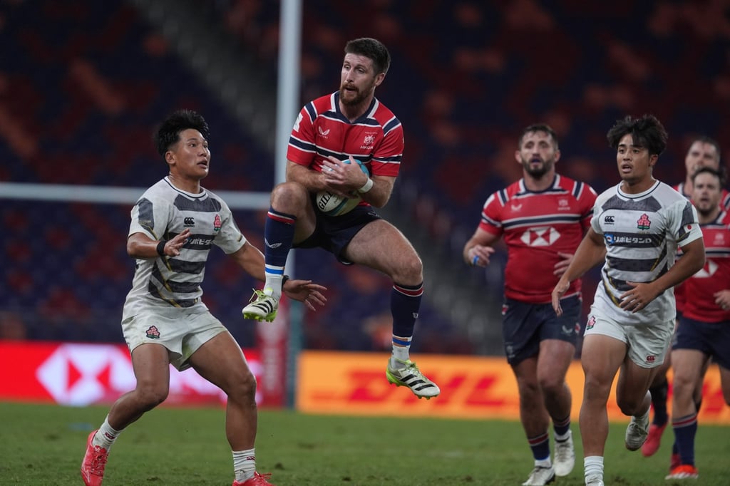 Hong Kong’s Gregor McNeish claims the ball during the second half against Japan. Photo: Elson Li Hong Kong’s Gregor McNeish claims the ball during the second half against Japan. Photo: Elson Li
