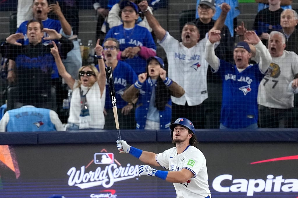 Toronto Blue Jays’ Addison Barger watches his grand slam home run take flight. Photo: AP
