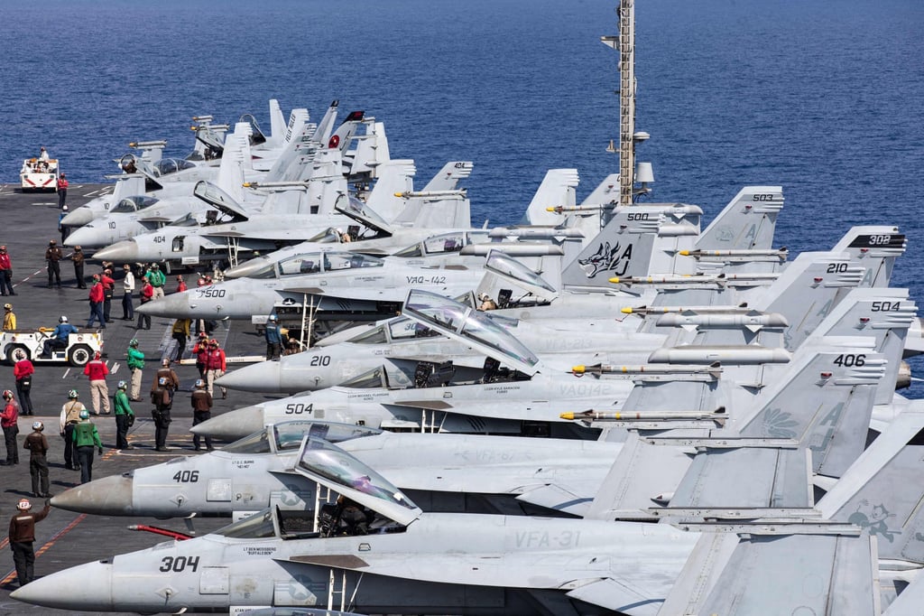 F-18 Super Hornets prepare for flight operations on the deck of the USS Gerald Ford in the Eastern Mediterranean Sea in October 2023. Photo: US Navy via AFP F-18 Super Hornets prepare for flight operations on the deck of the USS Gerald Ford in the Eastern Mediterranean Sea in October 2023. Photo: US Navy via AFP