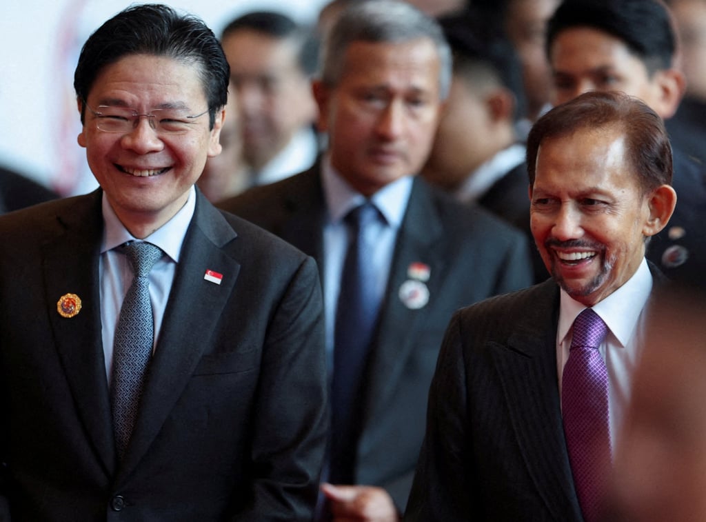 Singapore’s Prime Minister Lawrence Wong (left) walks with Brunei’s Sultan Hassanal Bolkiah at the 47th Asean Summit on Sunday. Photo: Reuters Singapore’s Prime Minister Lawrence Wong (left) walks with Brunei’s Sultan Hassanal Bolkiah at the 47th Asean Summit on Sunday. Photo: Reuters