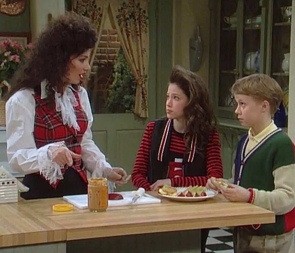 Jackie Tohn (centre) in The Nanny as a child. Photo: @jackietohn/Instagram