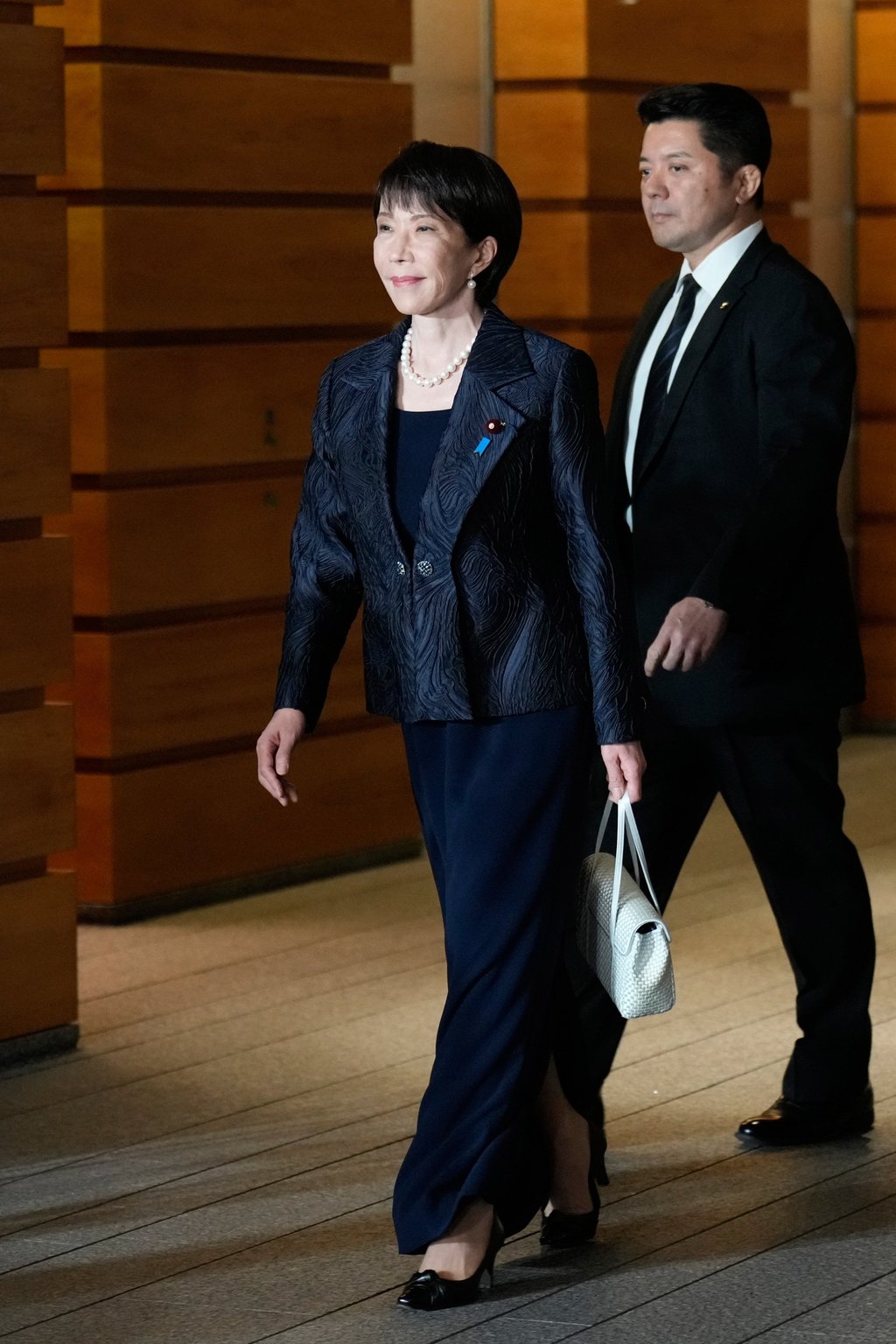 Sanae Takaichi heading to the Imperial Palace to participate in a formal appointment ceremony. Photo: AP