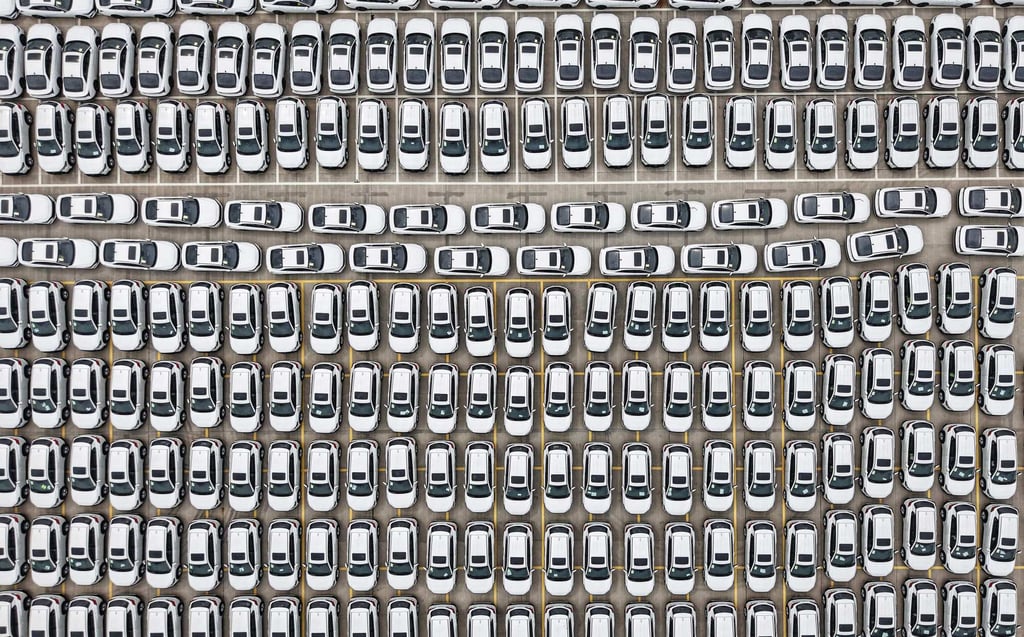 Electric vehicles for export are seen at a port in Hangzhou, in eastern China’s Zhejiang province on April 2. Photo: AFP Electric vehicles for export are seen at a port in Hangzhou, in eastern China’s Zhejiang province on April 2. Photo: AFP