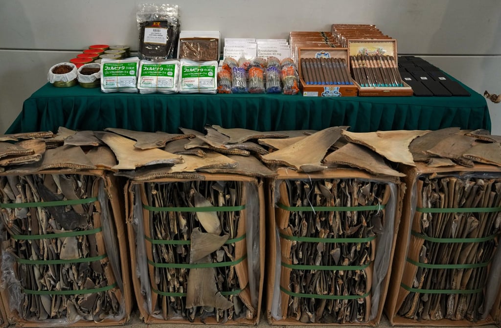 Customs says it found a large batch of suspected smuggled goods, including shark fins, cigars, mobile phones and pharmaceutical products. Photo: Jelly Tse Customs says it found a large batch of suspected smuggled goods, including shark fins, cigars, mobile phones and pharmaceutical products. Photo: Jelly Tse