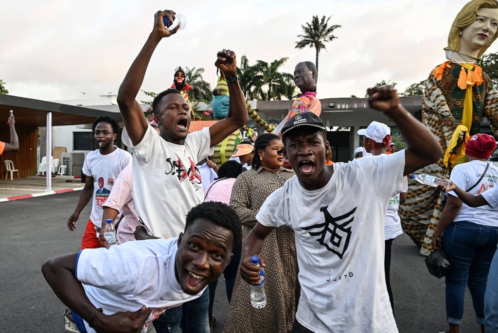 Supporters of Ivory Coast’s President Alassane Ouattara celebrate. Photo: AFP Supporters of Ivory Coast’s President Alassane Ouattara celebrate. Photo: AFP