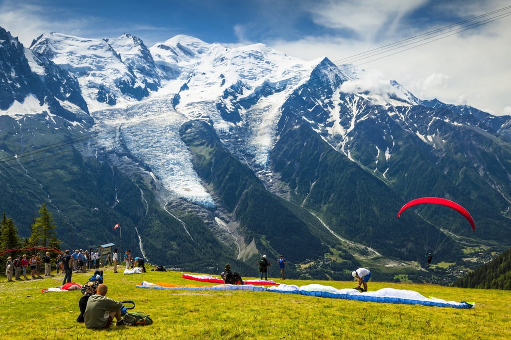 A paraglider takes off from a hilltop in the French Alps. Photo: Design Pics Editorial/Universal Images Group via Getty Images A paraglider takes off from a hilltop in the French Alps. Photo: Design Pics Editorial/Universal Images Group via Getty Images