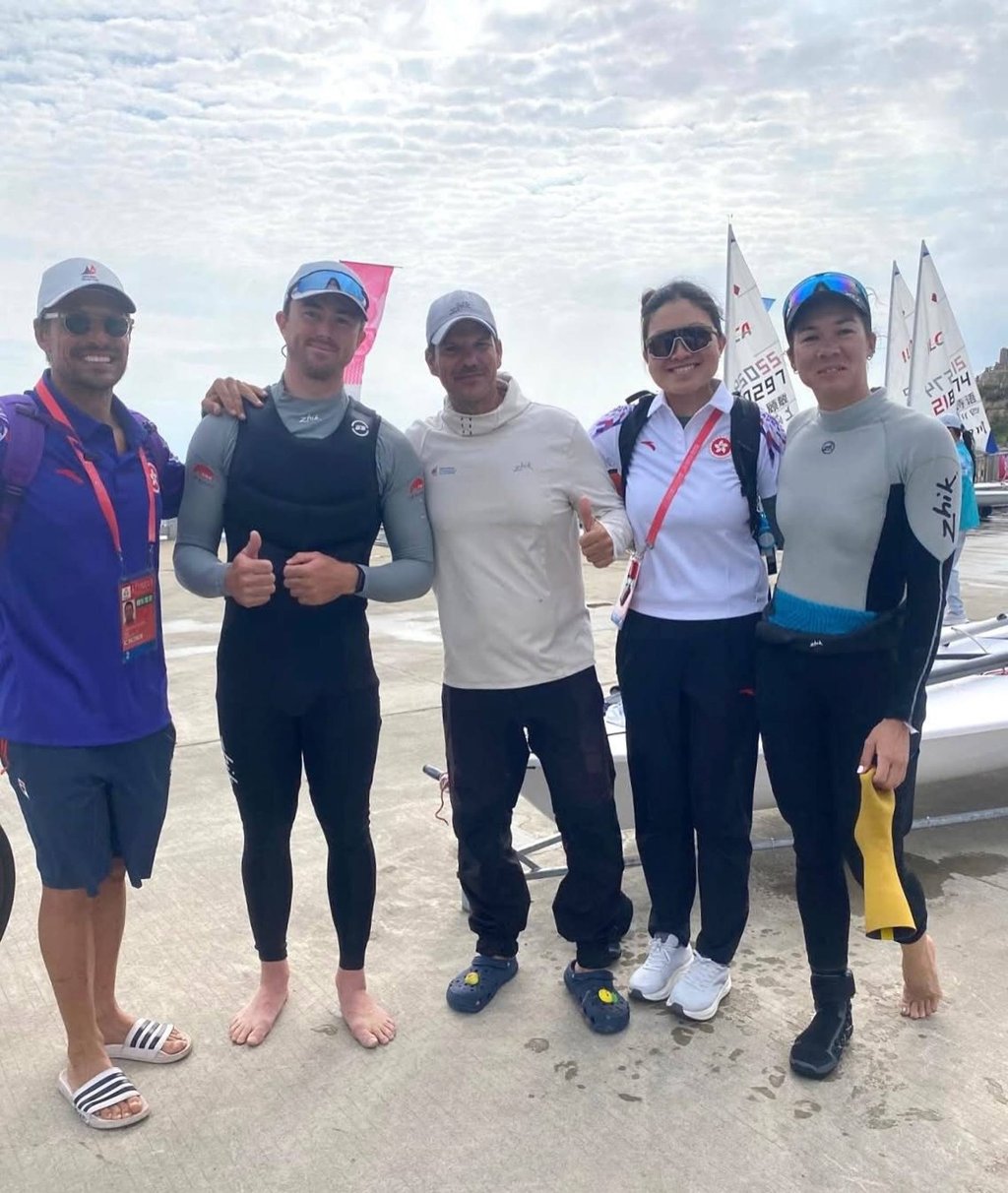 Nicholas Halliday (second from left) celebrates gold. Photo: Sailing Federation of Hong Kong, China Nicholas Halliday (second from left) celebrates gold. Photo: Sailing Federation of Hong Kong, China