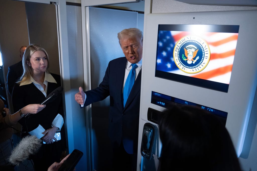 US President Donald Trump speaks to reporters aboard Air Force One en route to South Korea on Wednesday. Photo: AP US President Donald Trump speaks to reporters aboard Air Force One en route to South Korea on Wednesday. Photo: AP