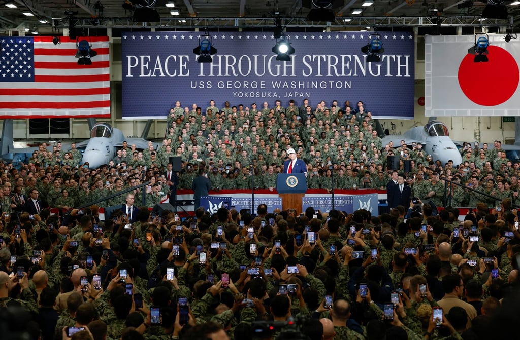 Donald Trump gives a speech aboard the aircraft carrier USS George Washington at the US Navy base in Yokosuka, Japan on Tuesday. Photo: Reuters Donald Trump gives a speech aboard the aircraft carrier USS George Washington at the US Navy base in Yokosuka, Japan on Tuesday. Photo: Reuters