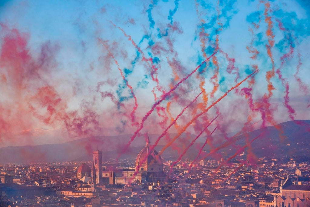 Fireworks explode over the skyline during a show by Cai Guo-qiang titled City of Flowers in the Sky, in Florence, Italy, in November 2018. Photo: ANSA via AP Fireworks explode over the skyline during a show by Cai Guo-qiang titled City of Flowers in the Sky, in Florence, Italy, in November 2018. Photo: ANSA via AP