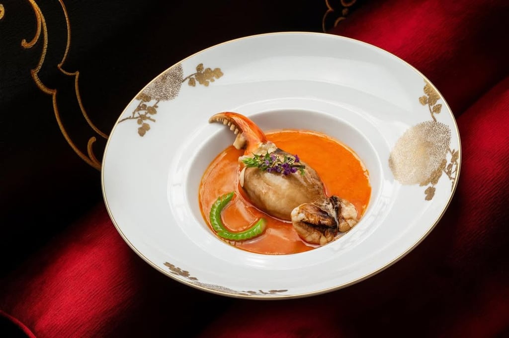 Crab claw with steamed French blue lobster broth and silky egg white at Palace Garden. Photo: Palace Garden Crab claw with steamed French blue lobster broth and silky egg white at Palace Garden. Photo: Palace Garden