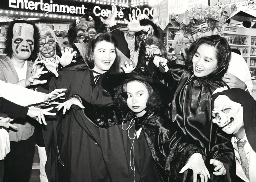 Local singer Teresa Carpio (front, centre in a witch’s hat and cloak), television presenter Deborah Moore (second from left) and actress Ellen Ng Ha-ping (second from right) attend a Halloween party at KPS Video Club’s megastore in Harbour City in 1988. Photo: SCMP Archives Local singer Teresa Carpio (front, centre in a witch’s hat and cloak), television presenter Deborah Moore (second from left) and actress Ellen Ng Ha-ping (second from right) attend a Halloween party at KPS Video Club’s megastore in Harbour City in 1988. Photo: SCMP Archives