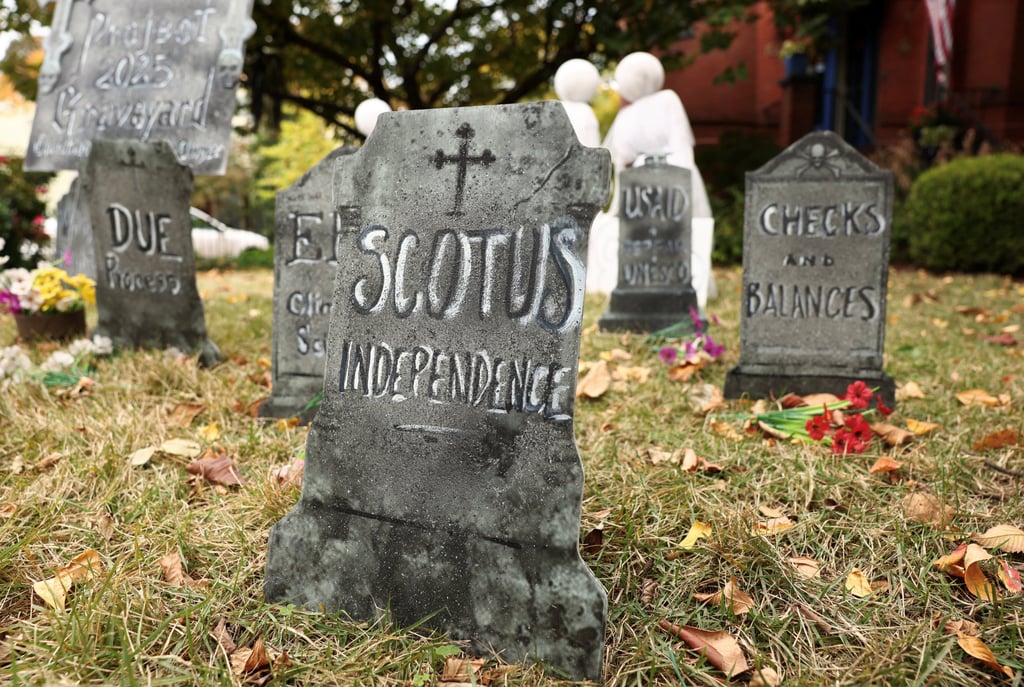 A politically themed Halloween tombstone decoration is seen in the “Project 2025 Graveyard” at the home of Donna Breslin in Washington on Wednesday. Photo: Reuters A politically themed Halloween tombstone decoration is seen in the “Project 2025 Graveyard” at the home of Donna Breslin in Washington on Wednesday. Photo: Reuters