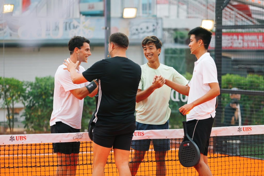 An exhibition match featuring (from left) UBS’s Pietro Pighi; Asier Gago, three-time padel champion in Asia; Hong Kong padel player Vincent Chau; and UBS’s Alan Sou.