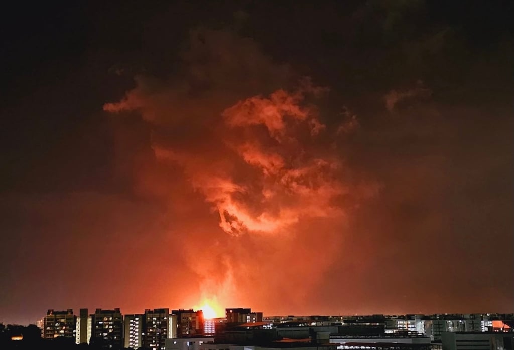 A view of a flare from a chemical plant at Pasir Gudang in Johor Bahru, Malaysia from an estate in Singapore. Photo: Facebook/Anne Yong